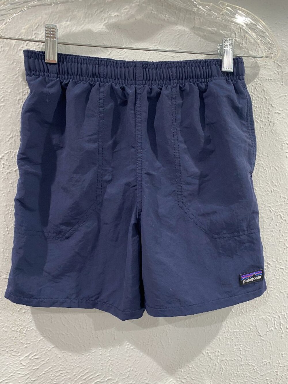 Patagonia, NWOT, boy's navy, size 12, swim trunks with liner, elastic waist.